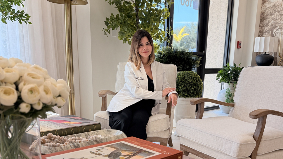 The warm, welcoming lounge of Elevated Beauty Medspa in Miami Lakes, FL